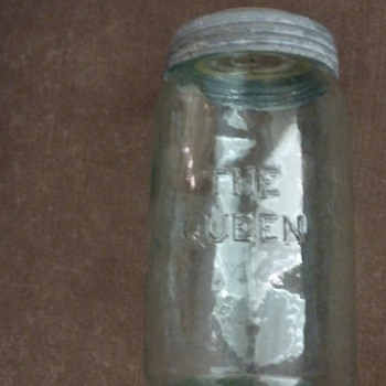 THE QUEEN Green glass jar-history? is it worth anything?