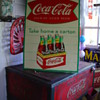 1959...Coca-Cola Sidewalk Six Pack Regular Size...Take Home A Carton...Sign Of Good Taste