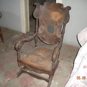 I need to know more about this antique rocker, please