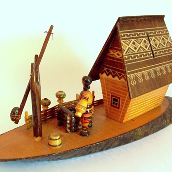 Carved wood bank with cottage scene Ukranian message on label - Folk Art