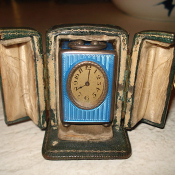 1800's traveling swiss clock with 13 jewels inside.
