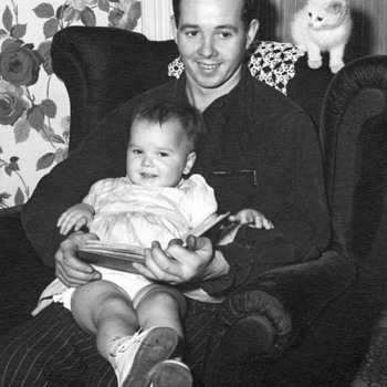 A Dad his girl, a few cats and book :-)  - Photographs