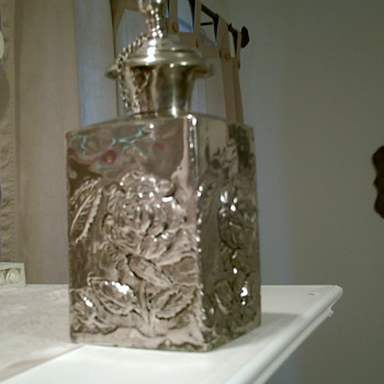 My new favorite decoration - a Rose Embossed Silver Canister