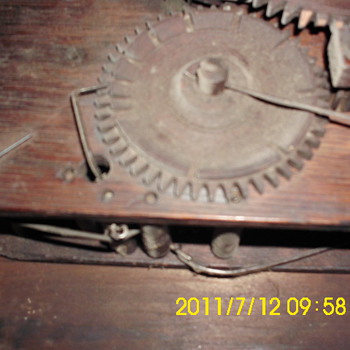 More old wooden clock works