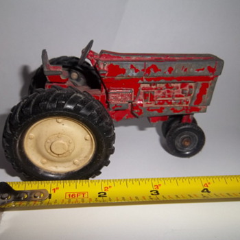 Vintage toy red farm tractor
