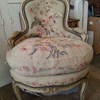 French victorian down filled needle point chair.