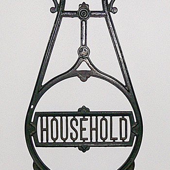 My favorite wall hanging... The side of a sewing machine stand - Advertising