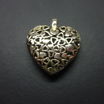 A VALENTINE'S HART-PENDIN OF ALL LITTLE HARTS INTO ONE BIG HART. - Fine Jewelry