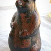 Need any info on this Curious looking Bear pottery Vase
