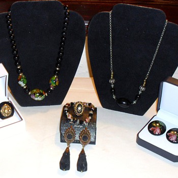 COLLECTION OF VINTAGE BLACK HAND PAINTED CELLUOID GEMS
