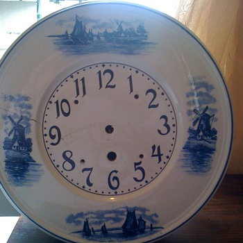 delft german porcelain with wind mills, wood octigone case wht. porcelain round front gustav becker clock. - Clocks