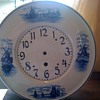 delft german porcelain with wind mills, wood octigone case wht. porcelain round front gustav becker clock.