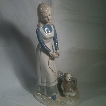 GIRL WALKING DOG. - Art Pottery