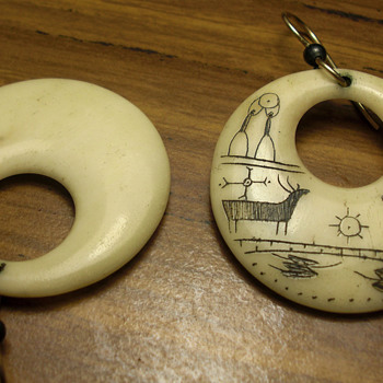Scrimshaw carved earings, Eskimo?