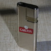 Four Cigarette Advertising Lighters...