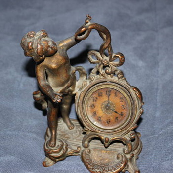 figurine clock