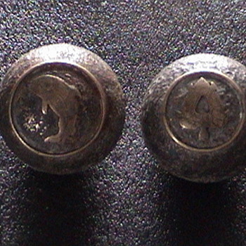 some sort of brass musical balls