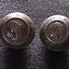 some sort of brass musical balls
