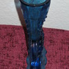 Glass boot on pedestal