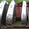 Mysterious set of Wilson RoundUp Golf clubs . with 7 1/2 and 81/2 irons.
