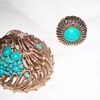 This is a matching adjustable ring and broch set...