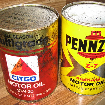 Pennzoil and citgo oil cans and glass insulators
