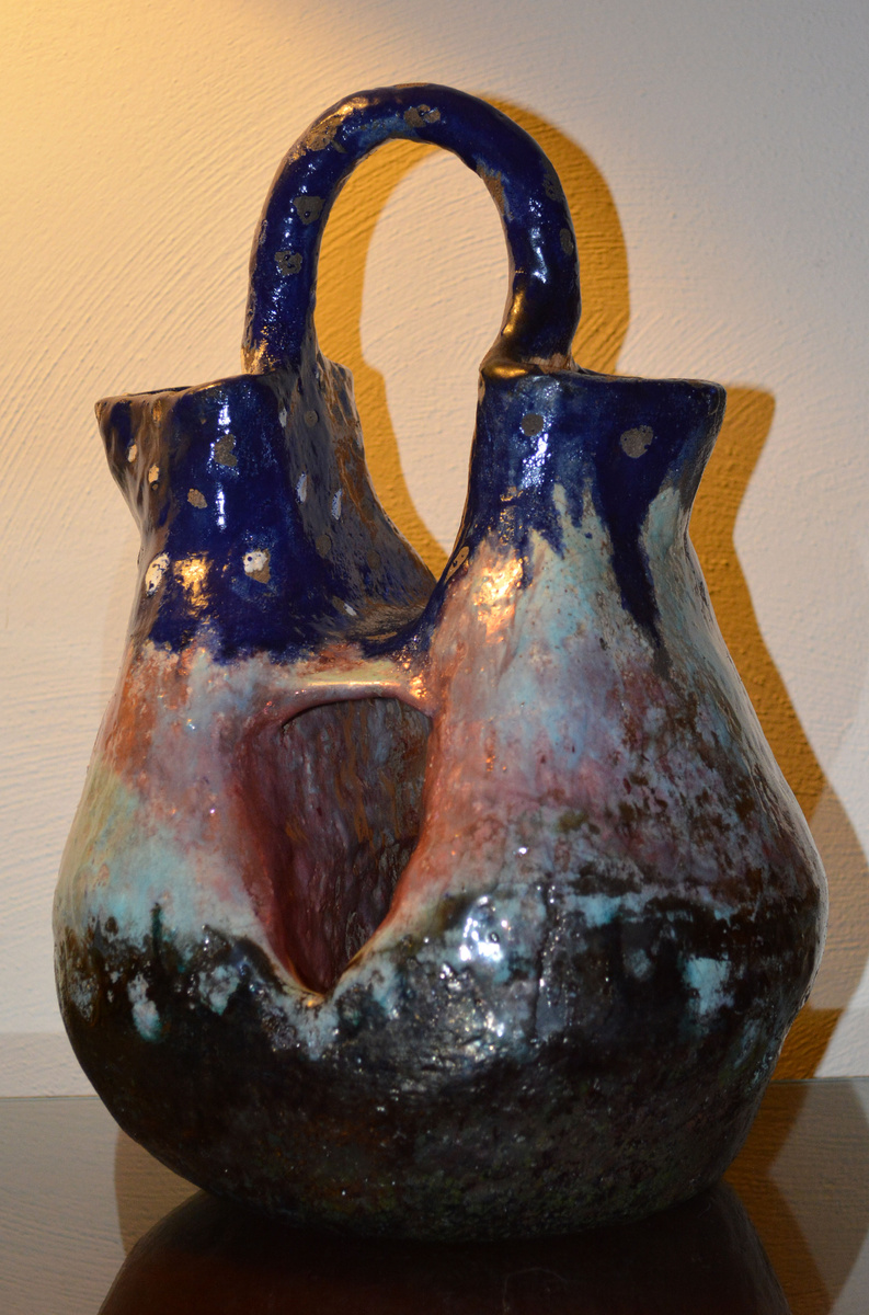 Strange shaped vase.....What is the hole for?? Collectors Weekly