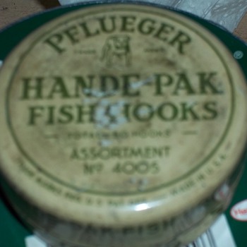 Tin of hooks