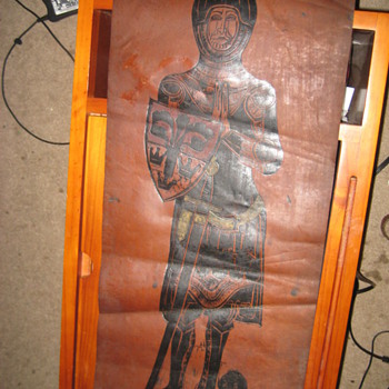 Old leather scroll with image of a dressed up man