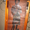Old leather scroll with image of a dressed up man