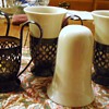 Gorham plated holders, and 4 ceramic coffee cups, who sold these or designed?