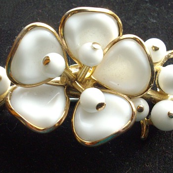 Signed Trifari poured glass brooch.