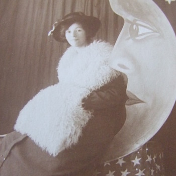 Photograph of Woman sitting on the "Man in the Moon"