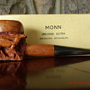 A very nice hand carved pipe with three deer carvings.