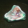 My parents used this heavy glass bowl as an ash tray.