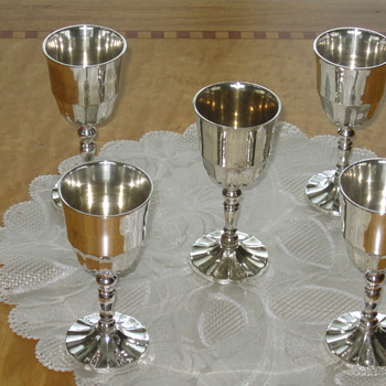 Silver wine goblets