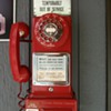 Red Payphone manufactured by Automatic Electric Co.