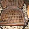 Cane wing-back chair.  Old?
