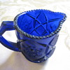 Tiny dark blue creamer
