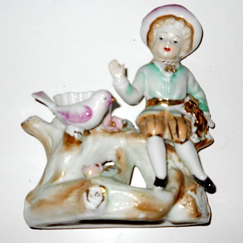 My little porcelain girl on bench with a pink bird - Art Glass