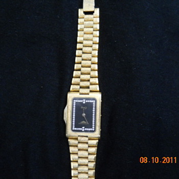 I am trying to find a value on this gift.  It is a Longines quartz