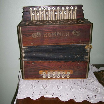 Vintage ( age unknown) Hohner accordion Still plays !