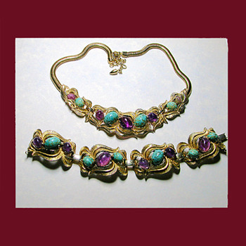 One of my favorites is this fabulous faux turquoise and amethyst demi. Signed BOUCHER - Costume Jewelry