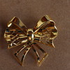 1940's retro 18 carat gold bow brooch