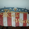 Two sided wooden boardwalk sign.