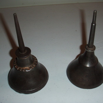 a pair of cast iron oil cans (1884 pat. date) - Petroliana