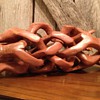 Carved wood interlocking camel stand
