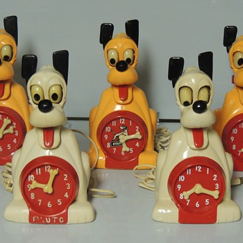 PLUTO ELECTRIC ANIMATED CLOCKS - Clocks