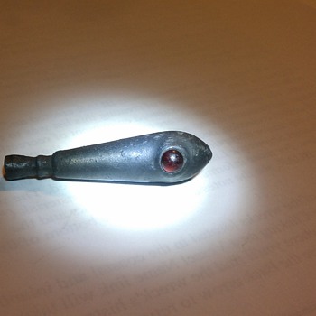 Unidentified lure with red glass eyes