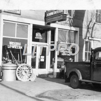PICTURE OF MY FATHERS JOHN DEERE DEALERSHIP 1942